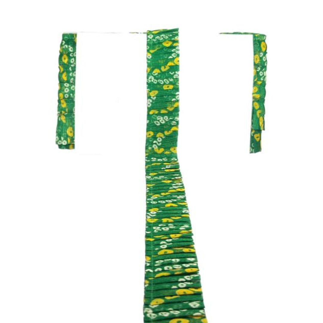Green floral patterned fabric on a white background